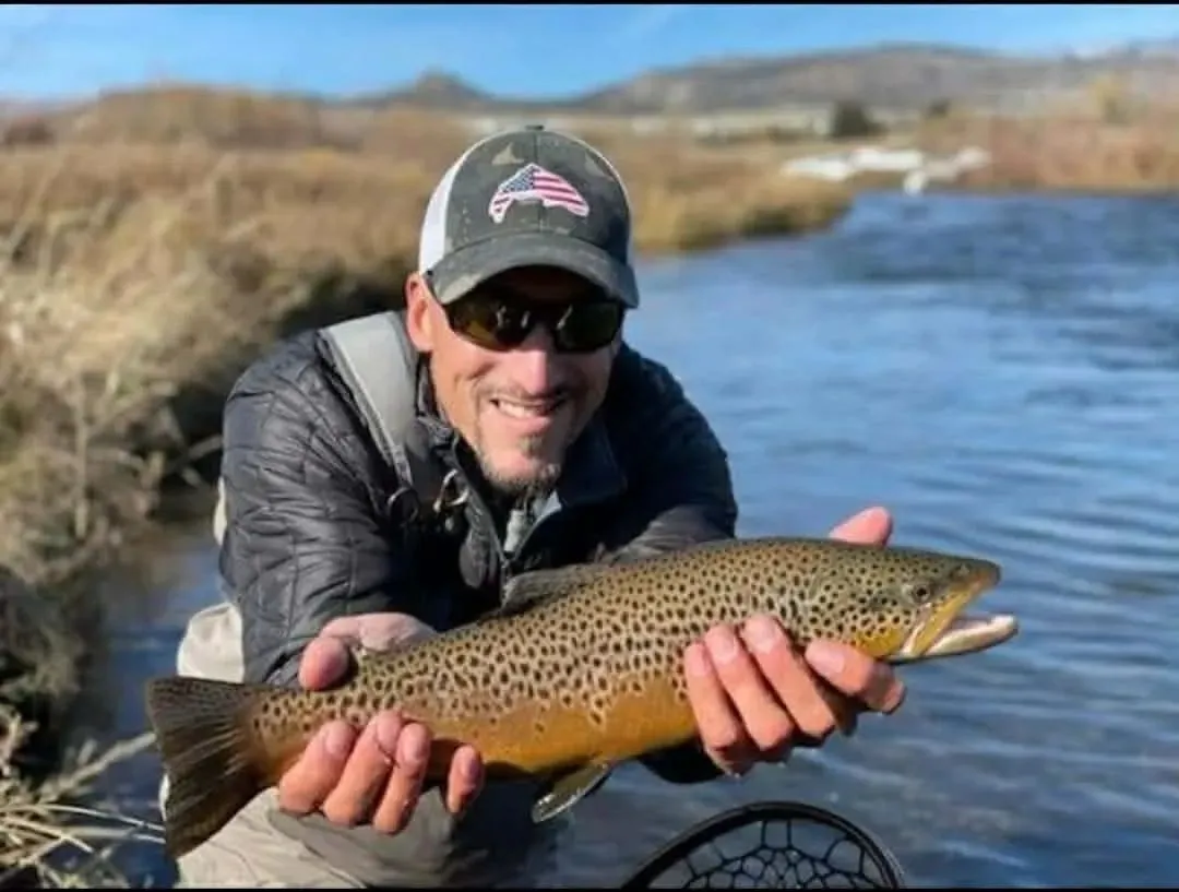 Dave Buck with a brown trout on the Bitterroot River