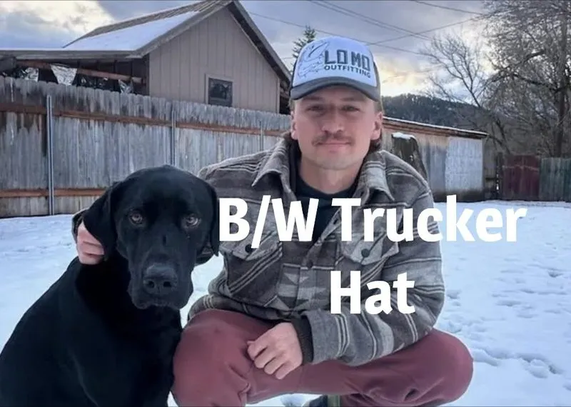 Lo Mo Outfitting trucker hat worn outdoors