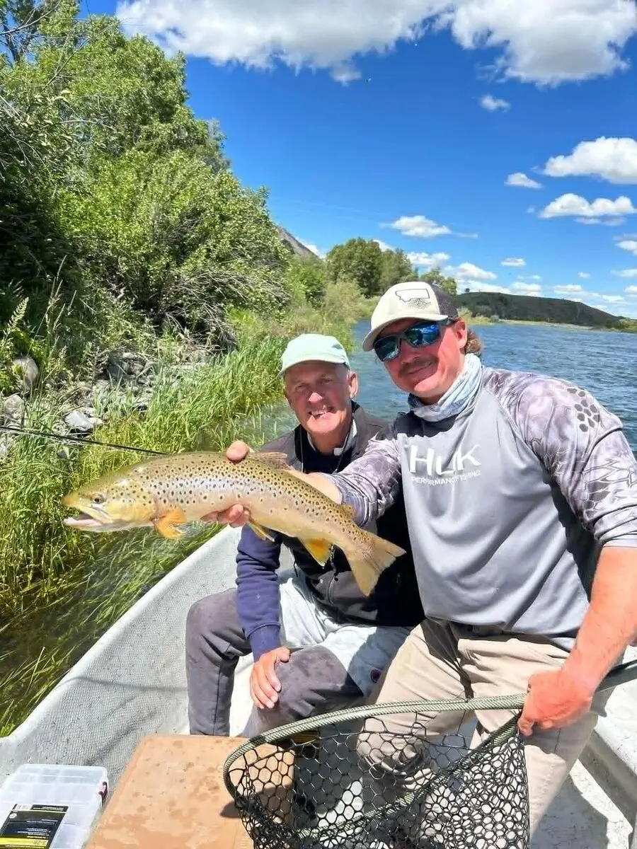 Guide and angler with a brown trout on the Missouri River